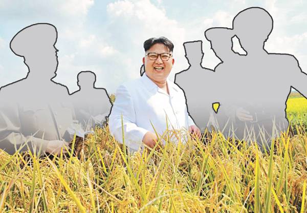 김정은 북한 국무위원장이 지난 2016년 9월 인민군 810부대 산하 한 농장을 방문한 모습. 뉴시스