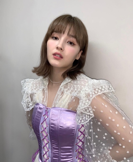 Group Momoland member Nancy showed off her lovely visuals.On the 29th, Nancy posted several photos on her Instagram with purple heart emoticons.The photo, which was posted in about four weeks after the last three days, attracted attention, and the photo showed Nancy wearing various stage costumes and taking various poses.In a beautiful dress reminiscent of a Princess in Fairytale, Nancy caught her eye with a sparkling beauty, with a small face and high nose creating an unrealistic atmosphere.Especially, Nancy is a show of irreplaceable charm with a neat hairstyle and dreamy eyes.Meanwhile, Momoland, which Nancy belongs to, performed on the stage of 2021 Dream Concert held at Seoul World Cup Stadium in Seongsan-dong, Mapo-gu, Seoul on the afternoon of the 26th.