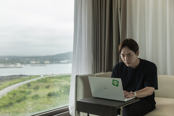 Hwang Jin-woo, a Line Plus employee, works from a hotel in Jeju Island. [LINE PLUS]