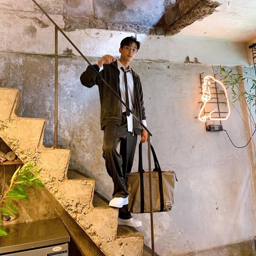 Singer and actor Jinyoung attracted attention with a warm visual.Jinyoung posted two photos on his Instagram on the 13th without any comment.The photo shows Jinyoung standing on the stairs and posing with a chic look.He wore a white shirt and Tie, matching a chacolate-colored training suit together, completing a casual styling: a small face, superior proportions and overwhelming clothing admiration.In particular, Jinyoung, wearing round glasses, thrilled The Earrings of Madame de... with visuals where boyhood and maturity coexist.The netizens who saw this responded such as I love you, I really do, I think someone is over thirty, Why are you so handsome?Meanwhile, Jinyoung is appearing in KBS2 new drama Police Class.