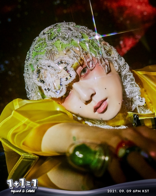 DAWN (DAWN) has unveiled a kitsch atmosphere Teaser linking Hyuna.Seven versions of DAWN (DAWN) versions of the Hyuna & DAWN EP [1+1=1] were released via the official SNS of P NATION on the afternoon of September 3.DAWN has released its own unique charm with fluorescent tones, including green hair.DAWNs intense eyes attract the attention of viewers as they overwhelm bling-bling costumes, makeup and accessories.Following the previously released version of the Hyona version Teaser, this DAWN version also offers a different concept of [1 + 1 = 1].The visuals of two people who fit well with the kitsch atmosphere make you look forward to the various contents to be released in the future.DAWN is a singer-songwriter with a unique sensibility, excellent lyric and composition sense. It has shown its ability as an artist by showing MONEY and DAWN Diri DAWN in Pination.This EP, which is the first result of the K-POP Diva Hyona, which makes trends, will be released as one, not two, and will contain two frank and unconventional music of various colors.