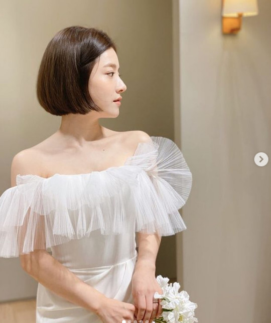 Singer Ben has unveiled a behind-the-scenes cut that was wearing a marriage-style Wedding Dress for Chuseok.Ben posted several photos on his personal Instagram account on September 22.Ben in the open photo is wearing a white Wedding dress of various designs.It is like an angel who smiles brightly at the camera, whether he saw Lee Wook, who was a prospective groom at the time, with the camera.The netizens who watched this cheered such as Where is the wing, It is so beautiful and It is like a fairy.Ben made a marriage ceremony in June after reporting marriage with W Foundation Chairman Lee Wook in 2020.On the other hand, Ben made his debut as a member of the group Bebe Mignon in 2010, and was loved by songs such as devoted and 180 degrees.