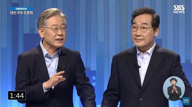 이재명(왼쪽)·이낙연 더불어민주당 대선 예비후보가 28일 밤 SBS에서 열린 TV 토론회에서 발언하고 있다.   SBS 화면