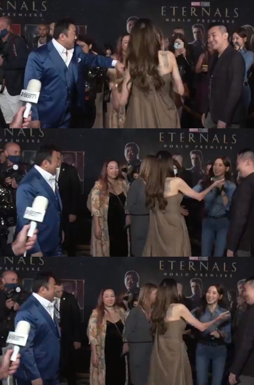 The latest episode of broadcaster Ye Jung-hwa, 33, was captured by surprise in four years.He accompanied the The Eternals world premier scene of Couple Ma Dong-Seok, 50, and showed off his unwavering love affair for five years.The World Premier Red Carpet Event of Marvels new film The Eternals was held at the Dolby Theater in Los Angeles on the 18th (local time).Director Chloe Zhao, Angelina Jolie, Richard Madden, Kumail Nanjiani, Lauren Ridloff, Brian Tyree Henry, Selma Hayek, Gemma Chan, Kit Harrington and Barry Caogan.Here, domestic actor Ma Dong-Seok was pleased to step on Red Carpet as one of the main cast members.The event was broadcast live on YouTube channel Marvel Entertainment, and another familiar face was noticed and surprised Korean netizens.The main character was Ye Jung-hwa, who was guarding the side of Ma Dong-Seok.Ye Jung-hwa looked like wearing a mask but attracted attention with her innocent beauty.In particular, he added attention to the recent situation in four years after the controversy over the damage of the famous plum plum plum in the Jeonju Gyeonggi Province in 2017.The last activity is also a boyfriend support shootout, and it is a cameo appearance of Ma Dong-Seoks 2017 movie Crime City.Ma Dong-Seok and Ye Jung-hwa overcame the 17-year-old and officially acknowledged their devotion in November 2016.In the fifth year of growing pink love, Ma Dong-Seok made a glimpse of his limited love with Ye Jung-hwa in his Hollywood debut event.In particular, he attracted a lot of crowds and focused attention on Ye Jung-hwas hand even in complex field situations.In addition, Ma Dong-Seok introduces Ye Jung-hwa directly to Angelina Jolie.Angelina Jolie approached Ye Jung-hwa, who had the world Premier scene on camera, and welcomed her and gave a warm atmosphere.Ye Jung-hwa also responded with a bright smile.Marvel Studios The Eternals is a film about the immortal hero who has lived without revealing its appearance for thousands of years, joining forces again to confront the oldest enemy of mankind, Debianz, since Avengers: Endgame.Domestic actor Ma Dong-Seok, who has been greatly loved by his overwhelming presence and extraordinary character in Busan, Crime City and With God series, joined Gilgamesh.It will be released on November 3.