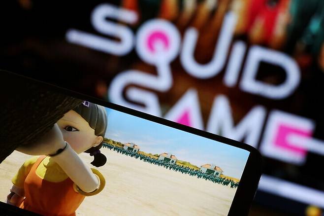 Netflix’s most popular release, “Squid Game” has led to an increase in subscribers beyond expectations. (Reuters/Yonhap News)