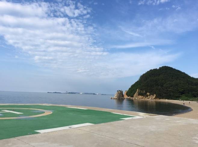 An image of a heliport on the island, where the contestants are transported via helicopter to a nearby luxurious hotel offering delicious food and spa treatment, called “Paradise” island on the show. (Incheon Tourism Organization)