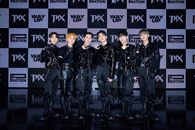 Rookie boy band TNX poses for pictures during its debut media showcase held in Seoul on May 17. (P Nation)