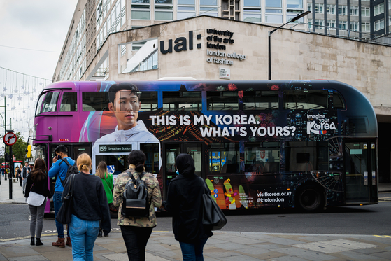 This image, provided by the culture ministry on Oct. 17, 2021, shows a British double-decker bus covered with a promotional image for Korea as a tourist destination featuring football star Son Heung-min. [NEWS1]