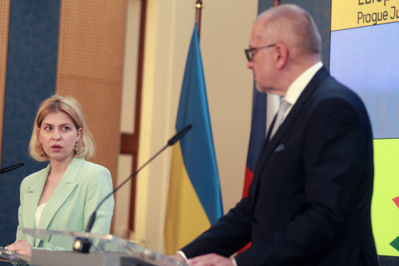 Ukraine's Deputy Prime Minister Olha Stefanishyna, left, attends a joint press conference with Czech Minister for European Affairs Mikulas Bek, right, after their meeting on the Czech presidency of the Council of the European Union and Russia's aggression against Ukraine in Prague, Czech Republic, on July 14. [AFP/YONHAP]