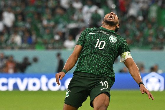 Saudi Arabia's midfielder Salem Al-Dawsari reacts after missing a shot at goal during the Qatar 2022 World Cup Group C football match between Poland and Saudi Arabia at the Education City Stadium in Al-Rayyan, west of Doha on Nov. 26. [AFP/YONHAP]