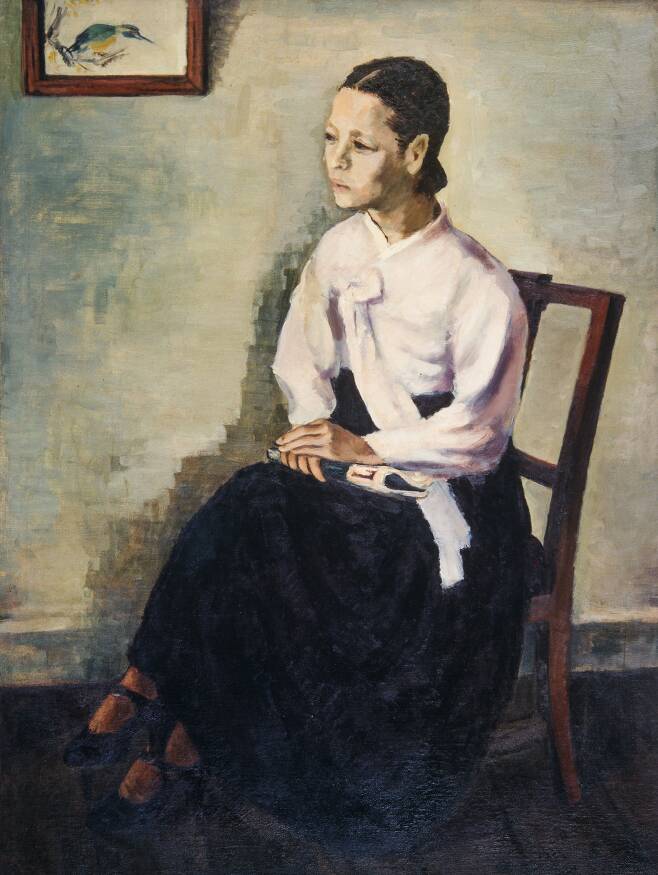 임군홍, ‘여인좌상’, 1936, 국립현대미술관 소장. 조선미술전람회 입선작이다. 개량 한복을 입고, 구두를 신은 채 손에는 ‘라이프’ 잡지를 들고 있는 신여성의 모습을 그렸다.