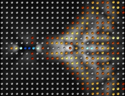 유체역학적 결정의 컴퓨터 시뮬레이션. 유체역학적 결정에서 입자쌍(가장 왼쪽에 있는 오렌지색과 노란색 입자)이 후방에 있는 입자들을 요동시켜 준입자들이 마치 초음속 제트기 뒤에서 볼 수 있는 원뿔 모양으로 퍼지면서 생성된다. *색은 입자쌍의 세기를 의미한다.(이웃한 입자 사이의 거리가 가까운 파란색이 가장 세기가 크고 빨간색, 노랑, 흰색 순으로 거리가 멀어지며 세기가 작아진다) 그리고 흰색의 배경은 이들의 속도를 의미한다.  그림제공=기초과학연구원