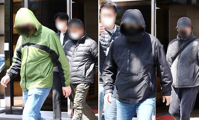 경기 김포의 한 택배 대리점 점주를 괴롭혀 극단적 선택에 이르게 한 혐의를 받는 택배노조원들이 작년 4월 법원 청사를 나서는 모습. 이들은 작년 12월 1심에서 징역형에 집행유예를 선고받았다. /연합뉴스