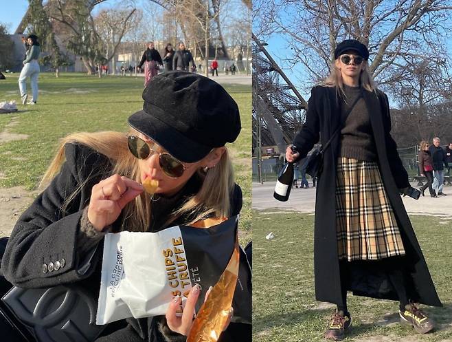 In the photo, Hyoyeon is taking a picture against the backdrop of the Paris Eiffel Tower in France. She showed a chic and stylish look wearing a check pattern midi skirt, a long coat, a newsboy cap and gilt sunglasses.