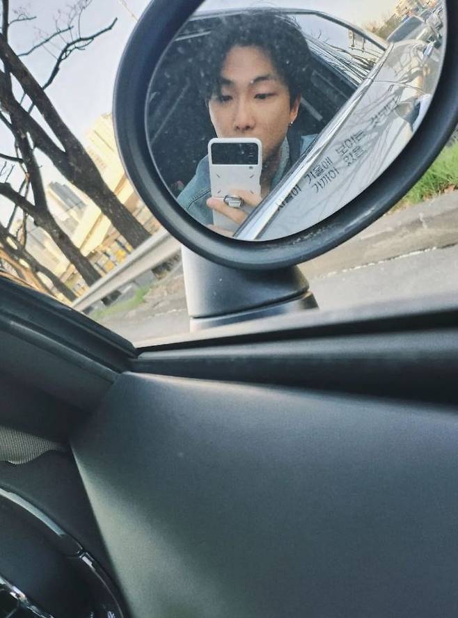 RM of the group BTS (BTS) had a leisurely time Gong Yoo.RM posted a message on his social networking service (SNS) on the 27th, along with several photos, saying, Im doing well.He took a self-portrait through a side mirror while riding in the car, creating a unique atmosphere.In addition, he also uploaded a Cherry Tree Photograph in the sun, and he had a leisurely time with his fans. He also uploaded various works of art, soaking in the unique atmosphere of RM.On the other hand, RM is about to join the army at the age of 30 in Korea, and such a member Jin joined the Army 5th Infantry Division recruitment training camp in Yeoncheon, Gyeonggi Province on December 13 last year.