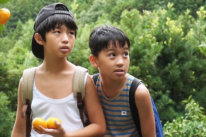 '1986 그 여름, 그리고 고등어통조림'의 한 장면(사진제공=와이드릴리즈)