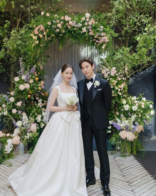 Girls Generation was even more frenzied in the wedding photos of Im Yoon-ah and Lee Joon-ho.On the 9th, Im Yoon-ah brought out happy memories of JTBC Drama  ⁇  King Land  ⁇   ⁇ , saying that it is an ending  ⁇   ⁇   ⁇ .Im Yoon-ahs memories were taken at the time of the landing, and Im Yoon-ah and Lee Joon-ho happily married at the ending.Lee Joon-ho dressed up in a tuxedo and Im Yoon-ah in a pure white wedding dress give a visual boost.In the wedding photos of Im Yoon-ah and Lee Joon-ho, Girls Generation Yuri said that Im Yoon-ah was so pretty, and Choi Sooyoung also left an envious response saying that it was a good idea.Lee Joon-ho, who despises laughter, and Im Yoon-ah, a smile queen who has to laugh, make a day to laugh at the VVIP lounge King the Land It is a drama depicting the story of making.The Land King Land  ⁇ , which ended at the end of the 16th on the 6th, showed the highest audience rating of 13.8% and earned its own highest rating.Im Yoon-ah and Lee Joon-ho are called  ⁇   ⁇   ⁇   ⁇   ⁇  couple, and they gave a pink throbbing weekend night with a romance rumor.