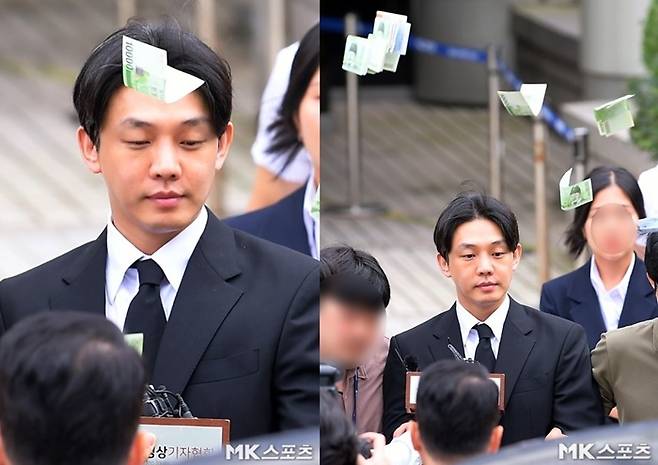 유아인이 유치장으로 이동하는 길에 한 시민이 돈을 뿌렸다. 제공|MK스포츠