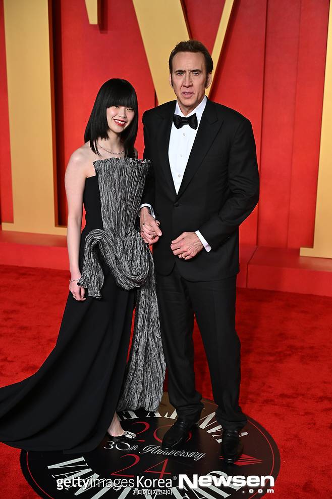 니콜라스 케이지와 그의 아내 시바타 리코