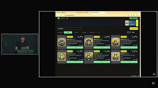 일리야 폴로수킨 니어 CEO가 지난 10일(현지시각) 태국 방콕에서 열린 리댁티드 행사에서 니어가 개발 중인 AI 비서 서비스로 밈코인을 만드는 방법을 시연하고 있다. /니어 제공
