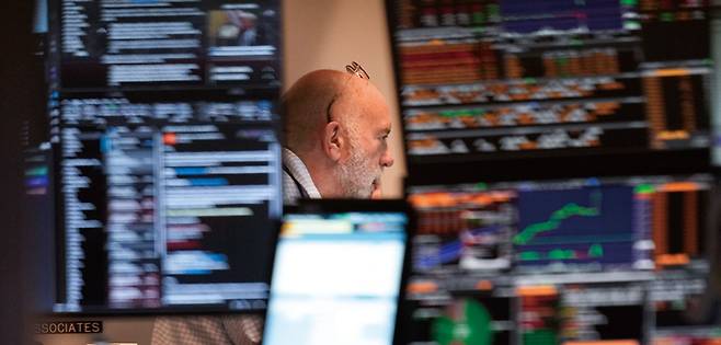 1월21일 뉴욕증권거래소에서 트레이더가 거래를 하고 있다. ⓒAP 연합