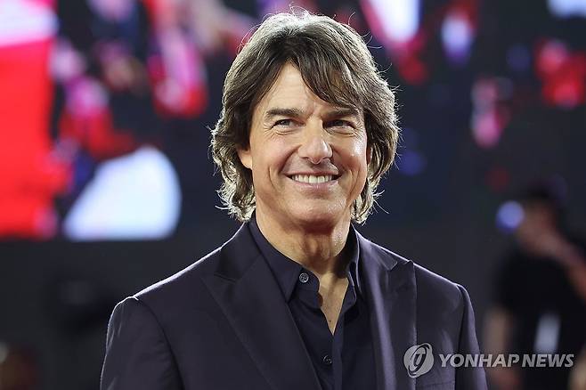 12번째 내한한 톰 크루즈 (서울=연합뉴스) 강민지 기자 = 할리우드 배우 톰 크루즈가 8일 서울 송파구 롯데월드 아이스링크에서 열린 영화 '미션 임파서블: 파이널 레코닝' 레드카펫 행사에서 포즈를 취하고 있다. 2025.5.8 mjkang@yna.co.kr