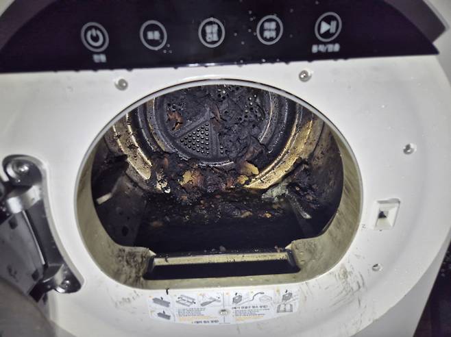 불이 난 건조기. 천안서북소방서 제공