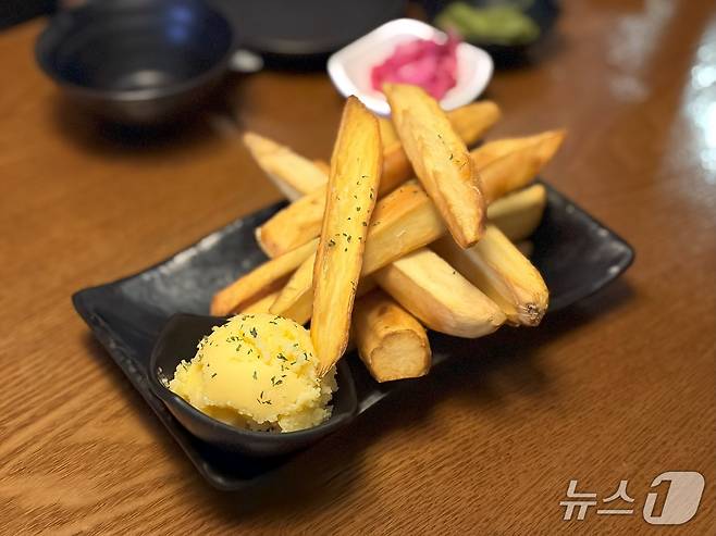 '싱글 카메라'이지만 '인물사진' 모드도 적용된다. 고구마 스틱은 맛있다. 2025.9.26/뉴스1 ⓒ News1 이기범 기자