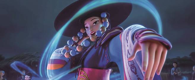 ‘케이팝 데몬 헌터스’에 등장하는 무당. 매기 강 감독은 “헌트릭스와 무당은 모두 귀신을 쫓는 존재라는 점에서 공통점이 있다”고 말했다. /넷플릭스