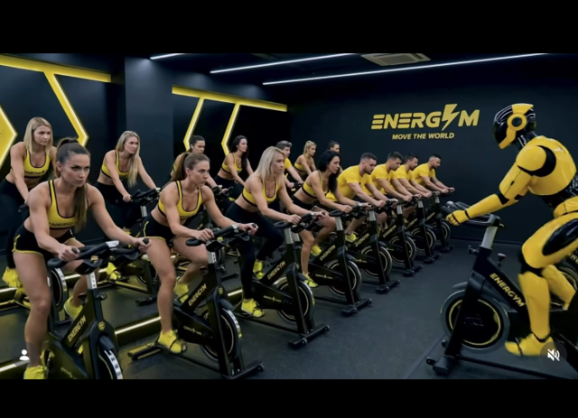 일자리를 잃은 사람들이 전기 자전거를 타며 인공지능(AI) 서버 동력을 만드는 내용의 가상광고가 화제가 되고 있다. AiCandy 인스타그램 캡처