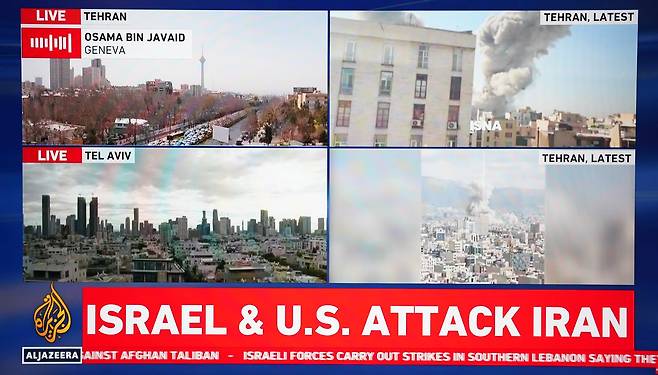 28일(현지시간) 이집트 카이로의 한 TV에서 미국과 이스라엘이 이란 공격을 시작했다는 카타르 알자지라 방송 속보가 방영되고 있다. 신화=연합뉴스