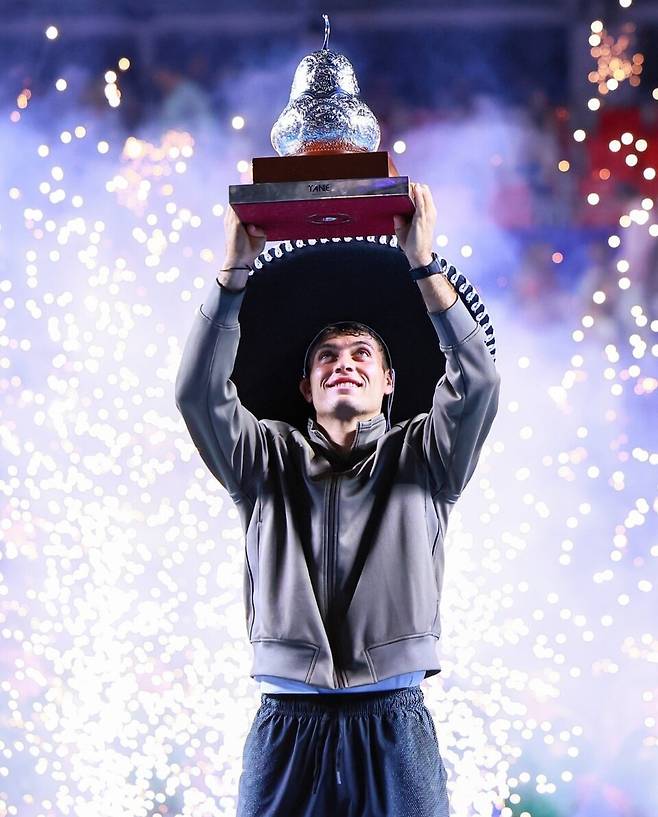 Flavio Coboli celebrates his singles win.