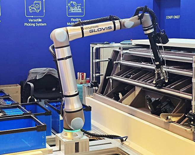 현대글로비스의 하이브리드 그리퍼 기반 ‘원키트 피킹 자동화 기술’./사진: 강주현 기자