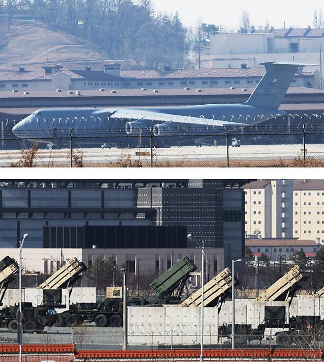 대기 중인 C-5 수송기·패트리엇 포대 8일 경기 평택시 주한 미 공군 오산기지에 C-5 수송기가 대기하고 있다(아래 사진). 이 기지에서 식별됐던 미군 대형 수송기들이 최근 한국을 떠난 것으로 파악되면서 주한미군 방공자산이 중동으로 차출됐다는 관측이 나왔다. 한·미 연합연습인 ‘자유의 방패’(FS·프리덤실드)를 하루 앞둔 이날 평택시 캠프 험프리스에 패트리엇 포대가 배치돼 있다(위 사진). 연합뉴스