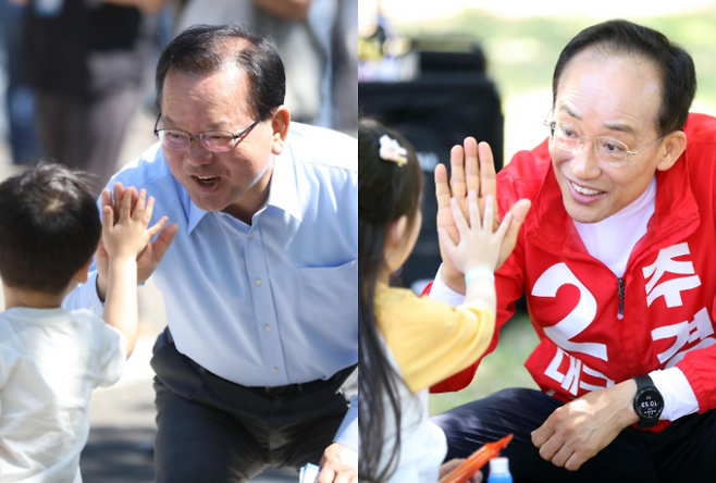 ▲ 어린이와 하이 파이브 하는 더불어민주당 김부겸(왼쪽), 대구시장 후보와 국민의힘 추경호 대구시장 후보. 연합뉴스