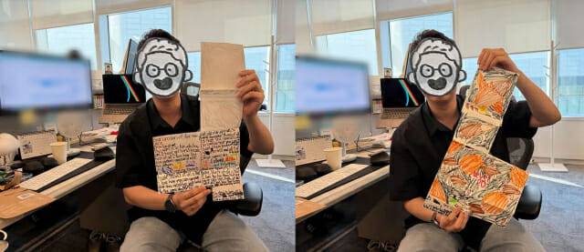 '디노 유니버스' 개발팀 일원이 손편지를 들고 있는 모습. 사진=슈퍼센트