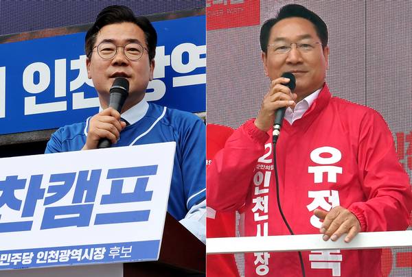 6·3 지방선거 공식 선거운동 첫날인 21일 인천시장 후보 더불어민주당 박찬대 후보, 국민의힘 유정복 후보가 유세를 하고 있다. 2026.5.21 /김용국·조재현기자