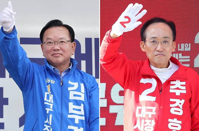 6·3 지방선거 공식 선거운동 이틀째인 22일 오전 김부겸 더불어민주당 대구시장 후보(왼쪽)가 대구 중구 반월당사거리에서 출근길 시민들을 향해 인사하고 있다. 추경호 국민의힘 대구시장 후보는 이날 오전 수성구 범어네거리에서 출근길 아침 인사를 하고 있다.두 후보자의 아침 인사 위치가 전날 오전과 정반대로 바뀐 상황이다. / 사진=뉴스1
