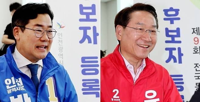 ▲ 제9회 전국동시지방선거 인천시장에 출마한 더불어민주당 박찬대(왼쪽) 후보, 국민의힘 유정복 후보가 지난 14일 인천 미추홀구 인천시선거관리위원회에서 후보 등록을 하고 있다. /이재민 기자 leejm@incheonilbo.com