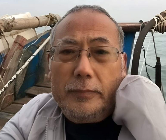 충남 태안을 통해 밀입국하다 체포된 중국 반체제인사 둥광핑(董廣平)