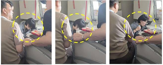 지난달 23일 중국 상하이행 항공기에서 발생한 응급상황에서 현대프리미엄아울렛 대전점 보건관리자인 이현주 사원이 승객의 상태를 확인하며 처치를 하고 있다. 현대아울렛 대전점 제공