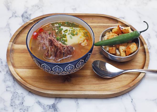 Uzbek shurpa (lamb and vegetable soup) served at Star Samarkand PARK SANG-MOON