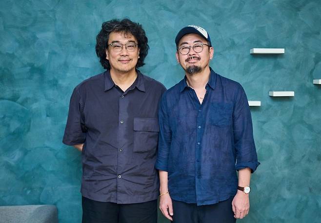 15일 서울 메가박스 코엑스에서 열린 영화 '호프' GV에 참석한 봉준호 감독(왼쪽)과 나홍진 감독. 플러스엠 엔터테인먼트 제공