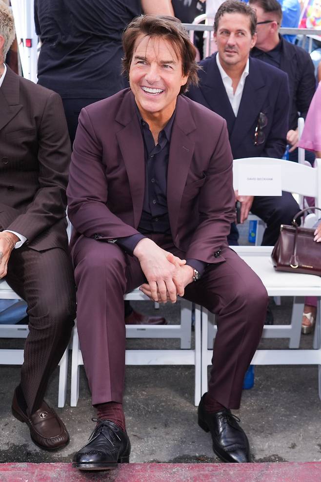 Tom Cruise attends a ceremony honoring David Beckham with a star on the Hollywood Walk of Fame on Friday, June 12, 2026, in Los Angeles. (AP Photo/Chris Pizzello)